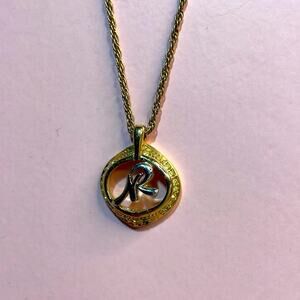 Nina Ricci Necklace 1 in Pendant on a 14 in Chain Gold tone Chain